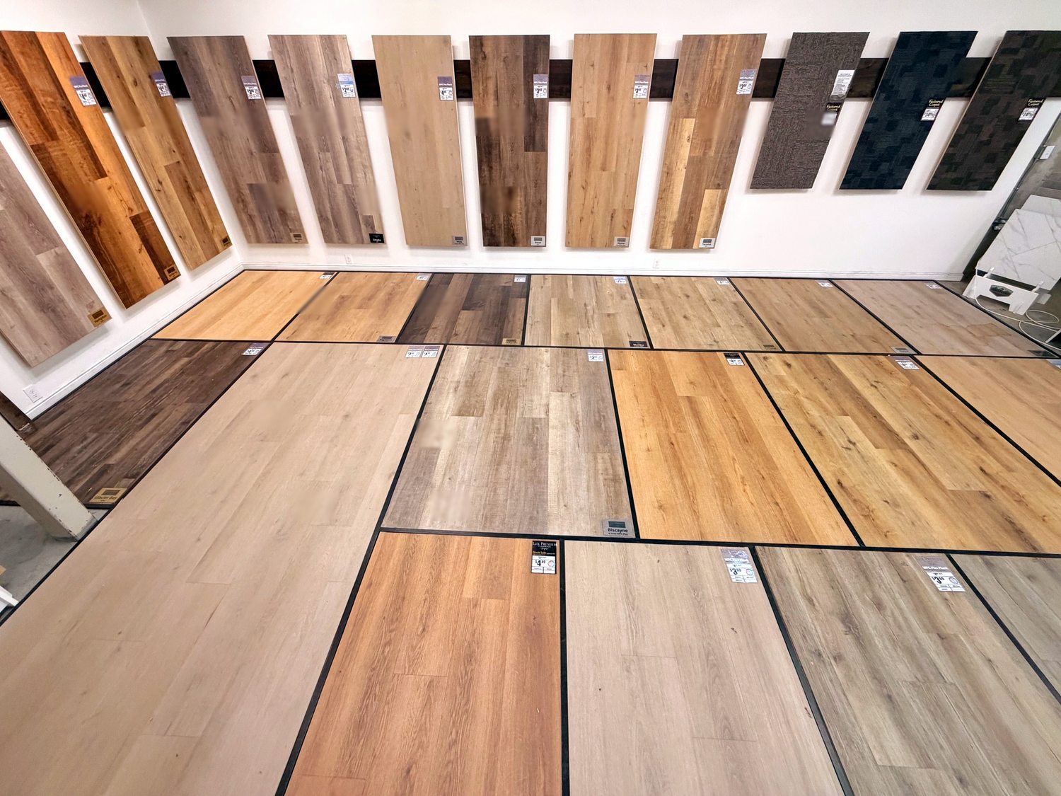 Wood-look laminate flooring display at Taylor Carpets and Flooring